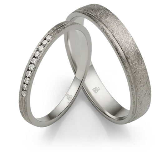 Rauschmayer-Ringpaar mit feinem Diamantenbesatz und Gravur auf der Innenseite
