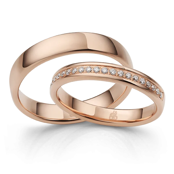 Roségoldfarbene Rauschmayer-Ringe mit weichen Formen und feinem Diamantenbesatz